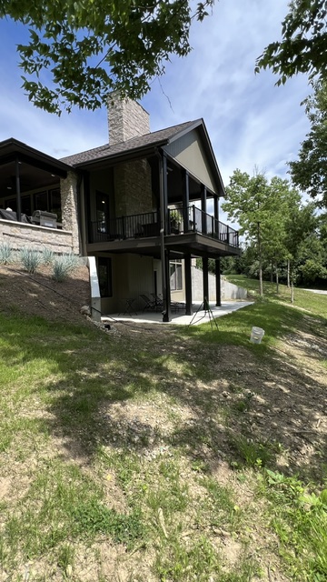 Hillside Retreat — Stone Chimney & Covered Deck