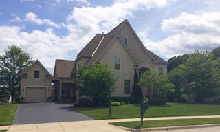 Stone & Stucco Two-Story Front Elevation